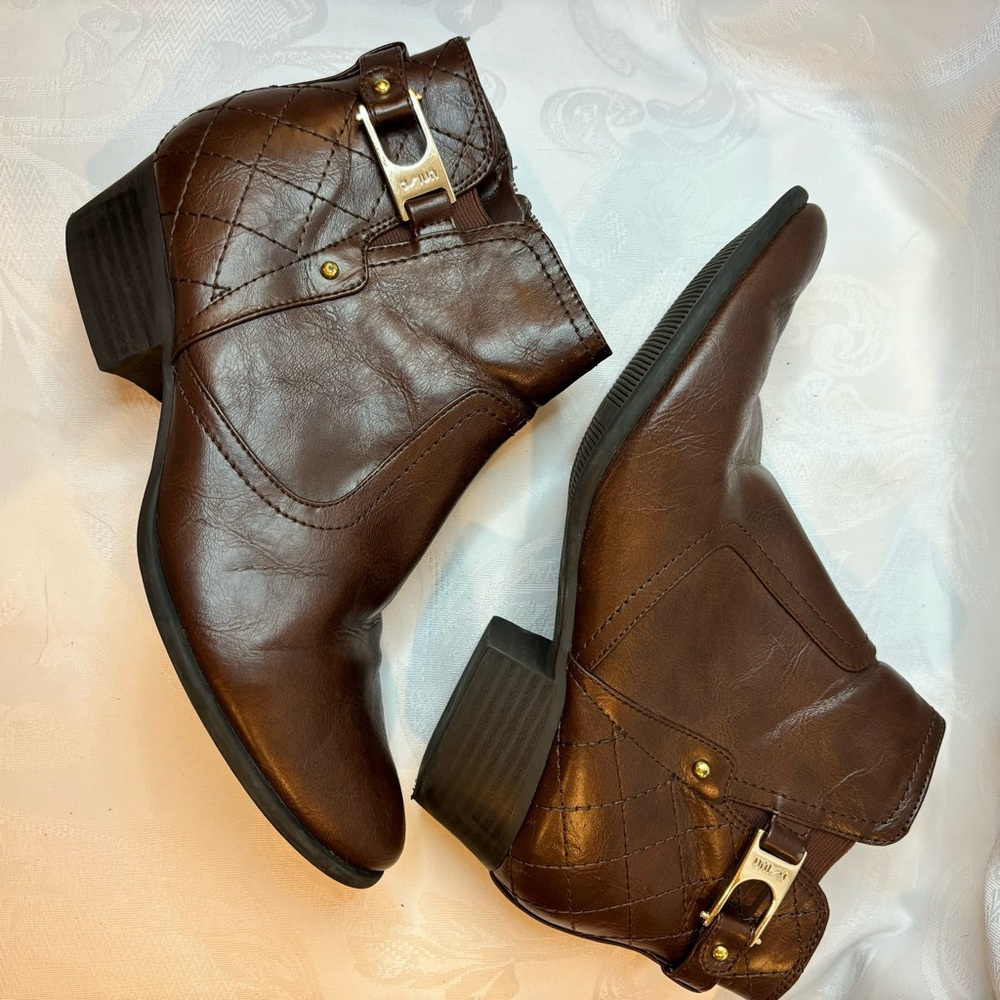 Unisa Brown Ankle Boots. Buckle and stud detail, zipper sides, size 9.5 medium.